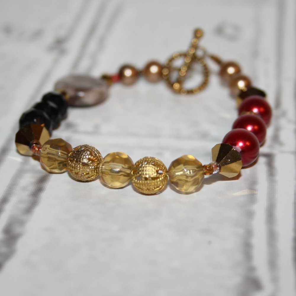 Beautiful gold, red and natural stone bracelet with toggle clasp 7.5"